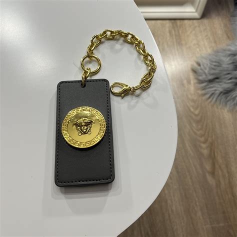 versace luggage tag|versace black and white purse.